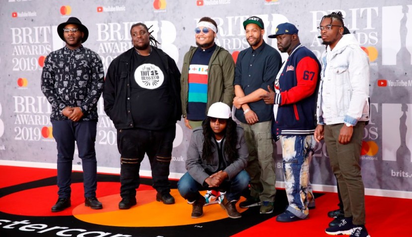 Bennie Pete with Hot 8 Brass Band Members