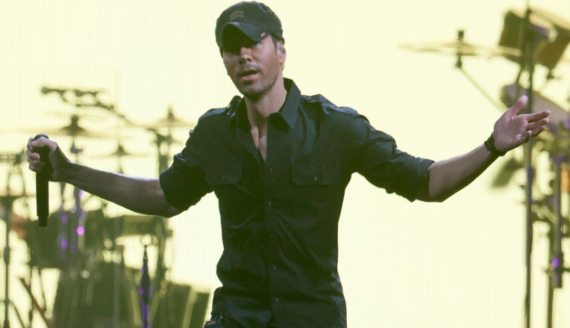 Enrique Iglesias Kisses A Fan During Meet & Greet—’What About His Wife?’ Fans Ask