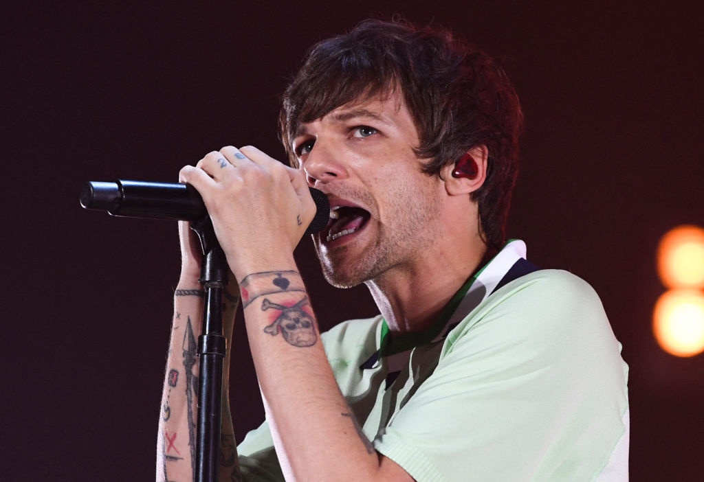 Louis Tomlinson may have accidentally married a fan