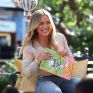 Hilary Duff reads during Epic!'s Go Anywhere Summer Kickoff Celebration supporting St. Jude (2022)