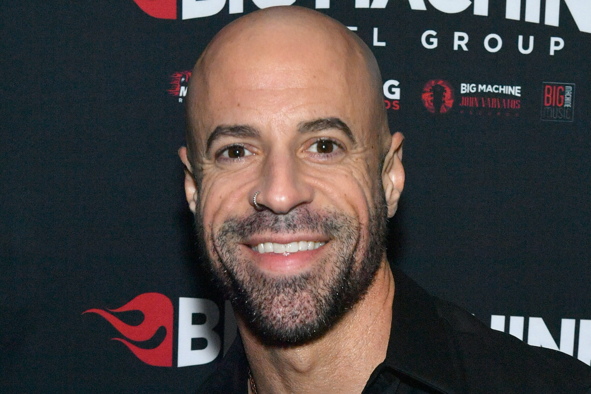 Chris Daughtry says his shocking black arm tattoo wasn’t meant to ‘excite you’