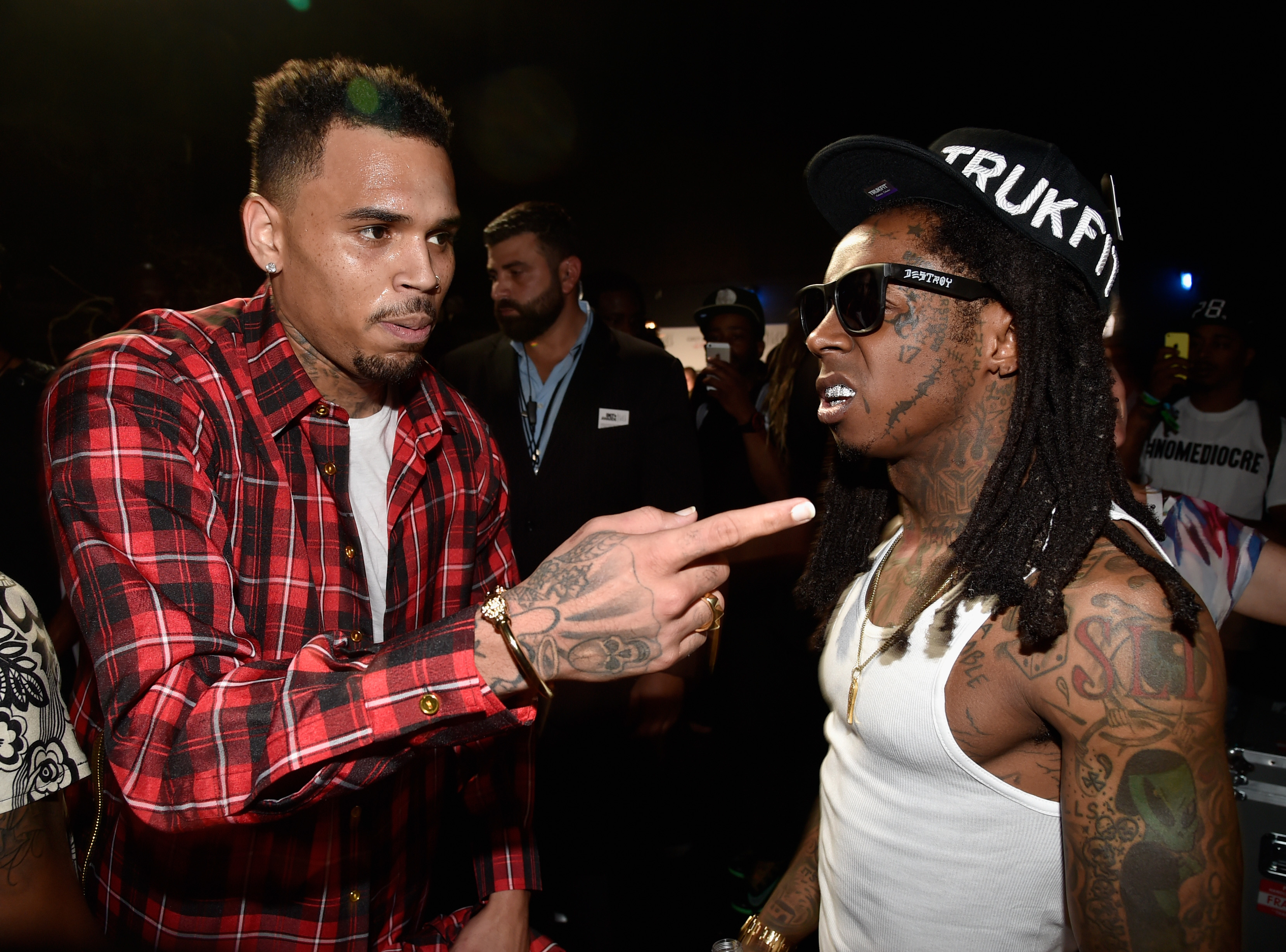 Lil Wayne, Chris Brown, and More Used Millions in COVID-19 Relief on Private Jets, Balenciaga and Gucci