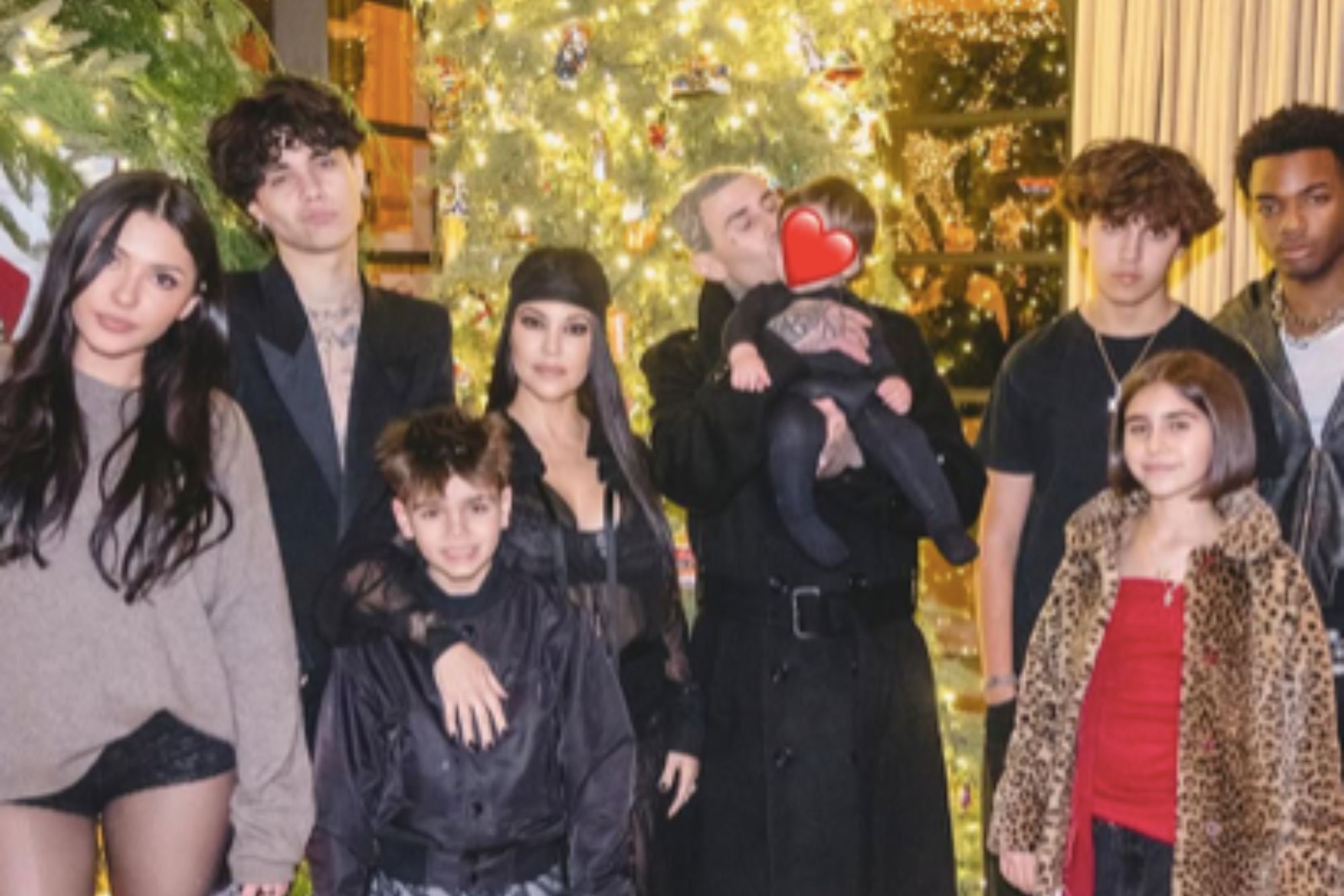 Kourtney Kardashian Shares Family Moment With Travis Barker Amid Sister Kim's 'Santa Baby' Controversy