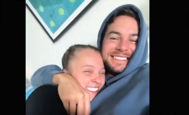 JoJo Siwa and Chris Hughes Show PDA at Airport Following