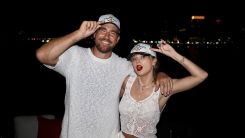 Travis Kelce and Taylor Swift make it Insta official