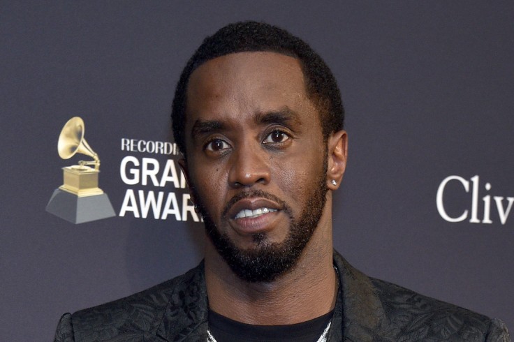 Go-go dancer accuses Diddy of forcing "sex slaves" to wear...