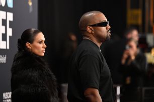 Kanye West (R) and Australian model Bianca Censori