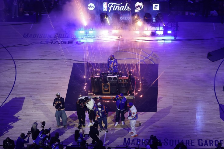 The Wu-Tang Clan perform at halftime of Game Four